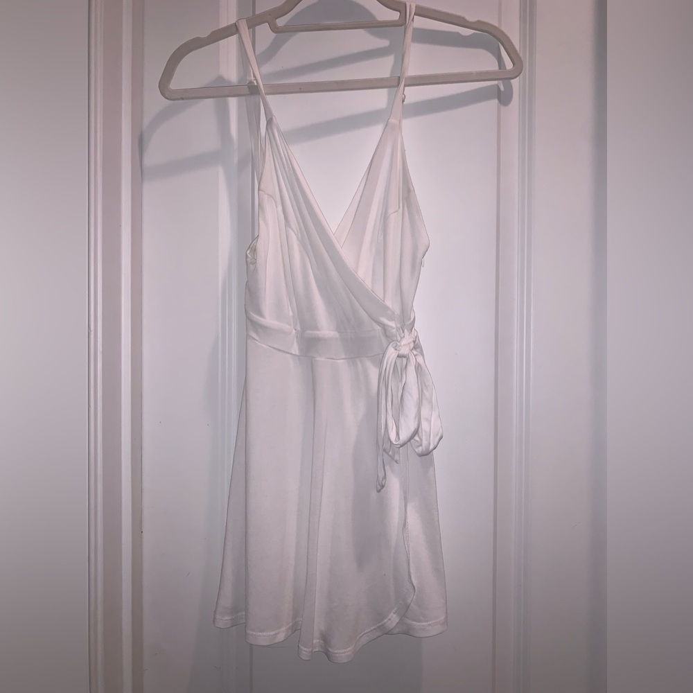 White romper with bow